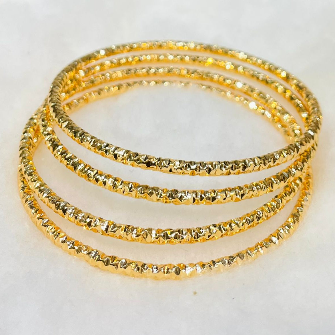 Gold‑Finish Stainless Steel Bangle Set — Elegant Textured Design