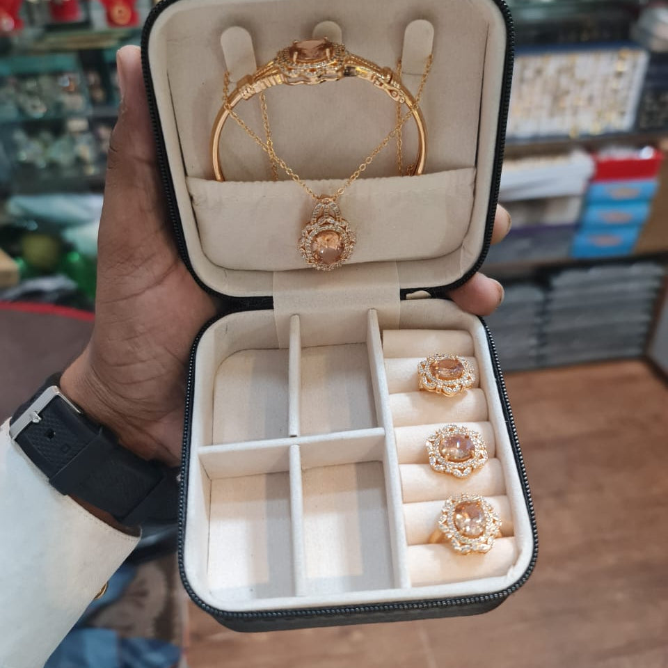 Elegant Golden Peachy Bloom 4-Piece Stainless Steel Jewelry Set — Ring Trio & Pendant Bracelet Combo